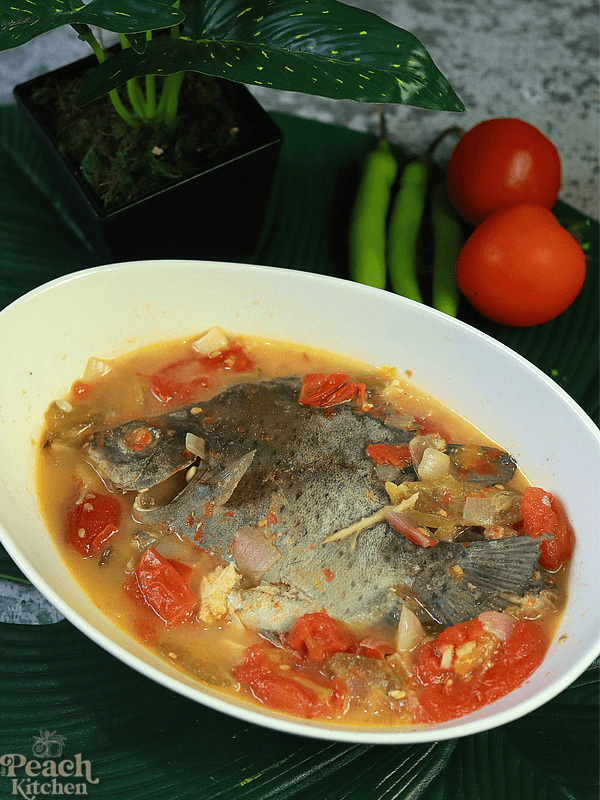 Pinangat na Kitang – Filipino fish stew cooked with kamias, ginger, and tomatoes, served with steamed rice
